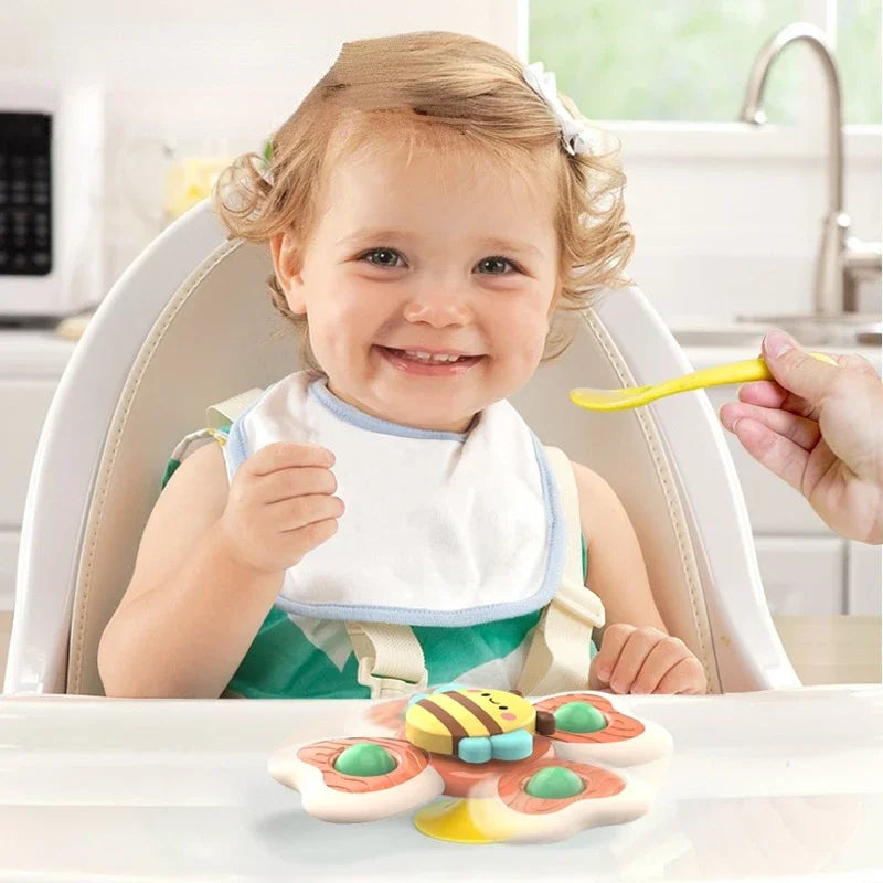 Jouet spinner à ventouse pour bébé