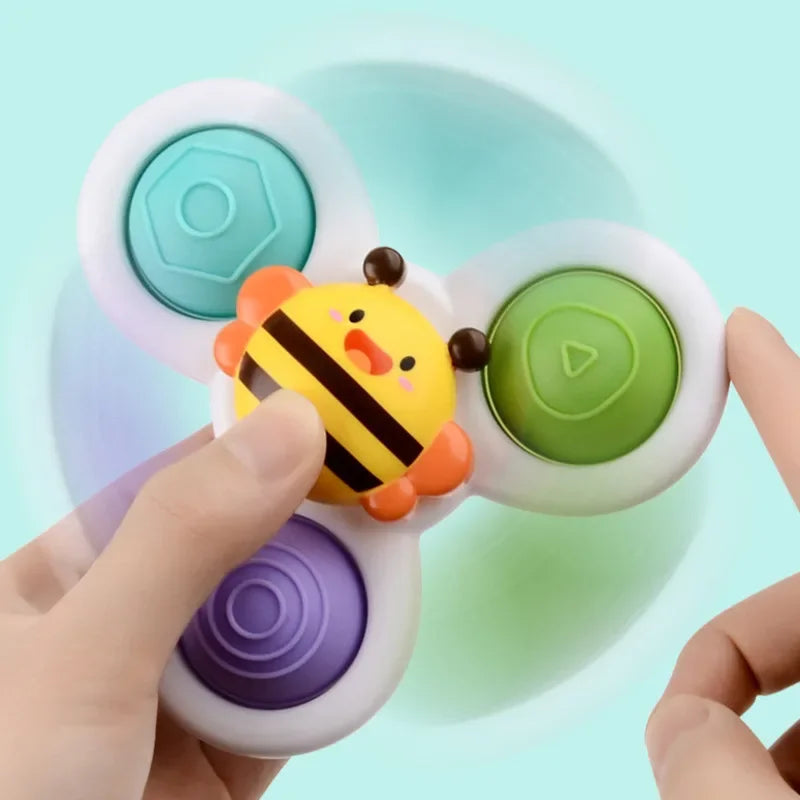 Jouet spinner à ventouse pour bébé
