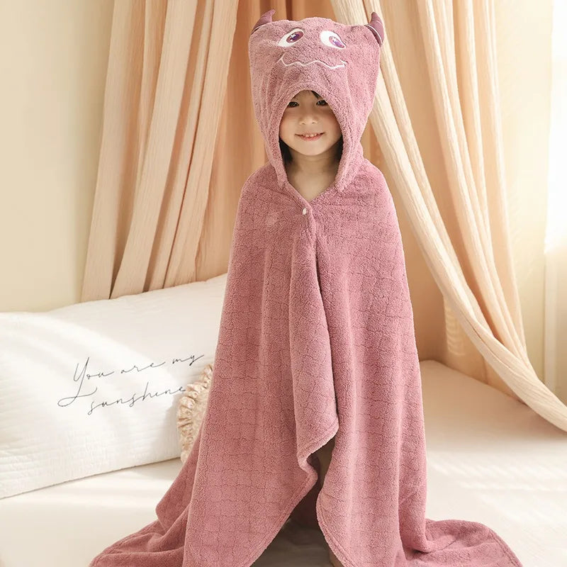 Poncho à capuche pour bébé